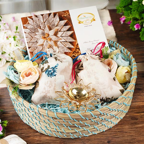 Blue Jute Basket of Kaju katli,  Dryfruits and Diya