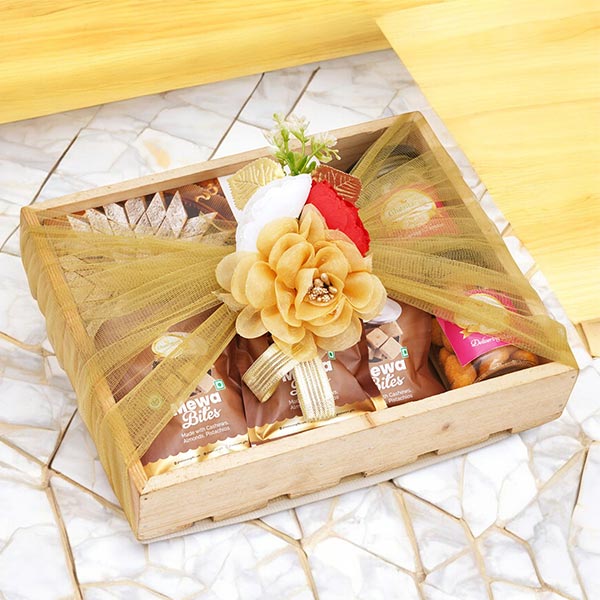 Wooden tray of Kaju Katli, 5 Mewa Bites and 2 Jars of Flavour Raisins and Cashews