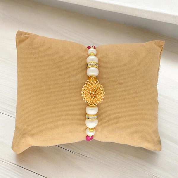 Alluring Gold Plated Pearl Rakhi for Brother